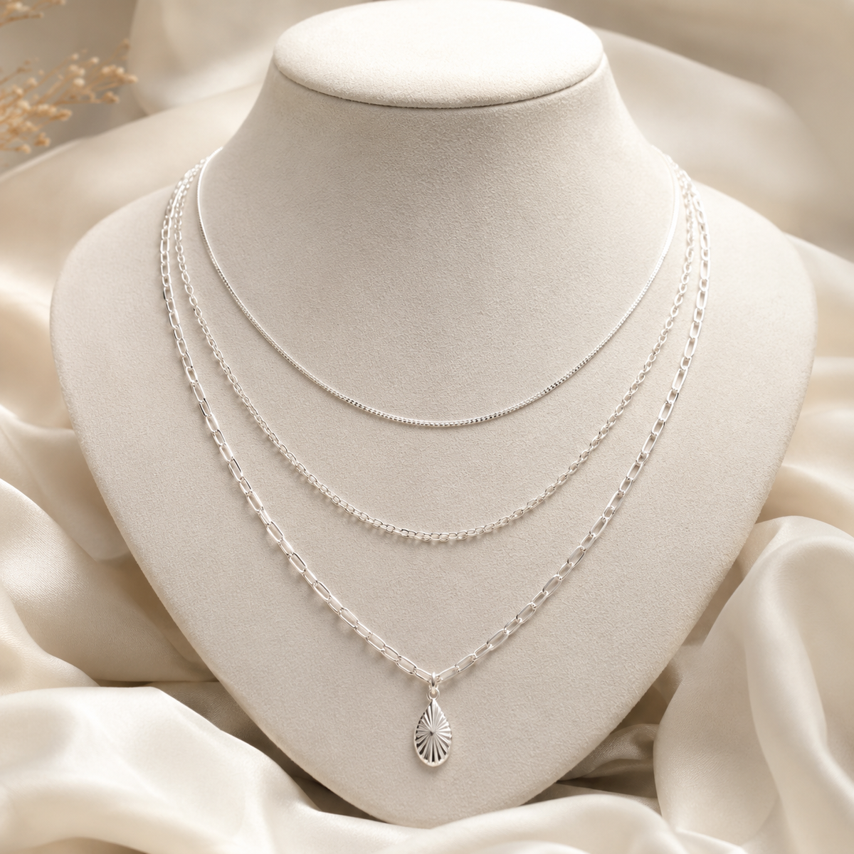 The Art of Layering Silver Chains and Necklaces