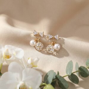 Gilded Pearl Bow Stud Earrings - 925 Sterling Silver Gold Plated